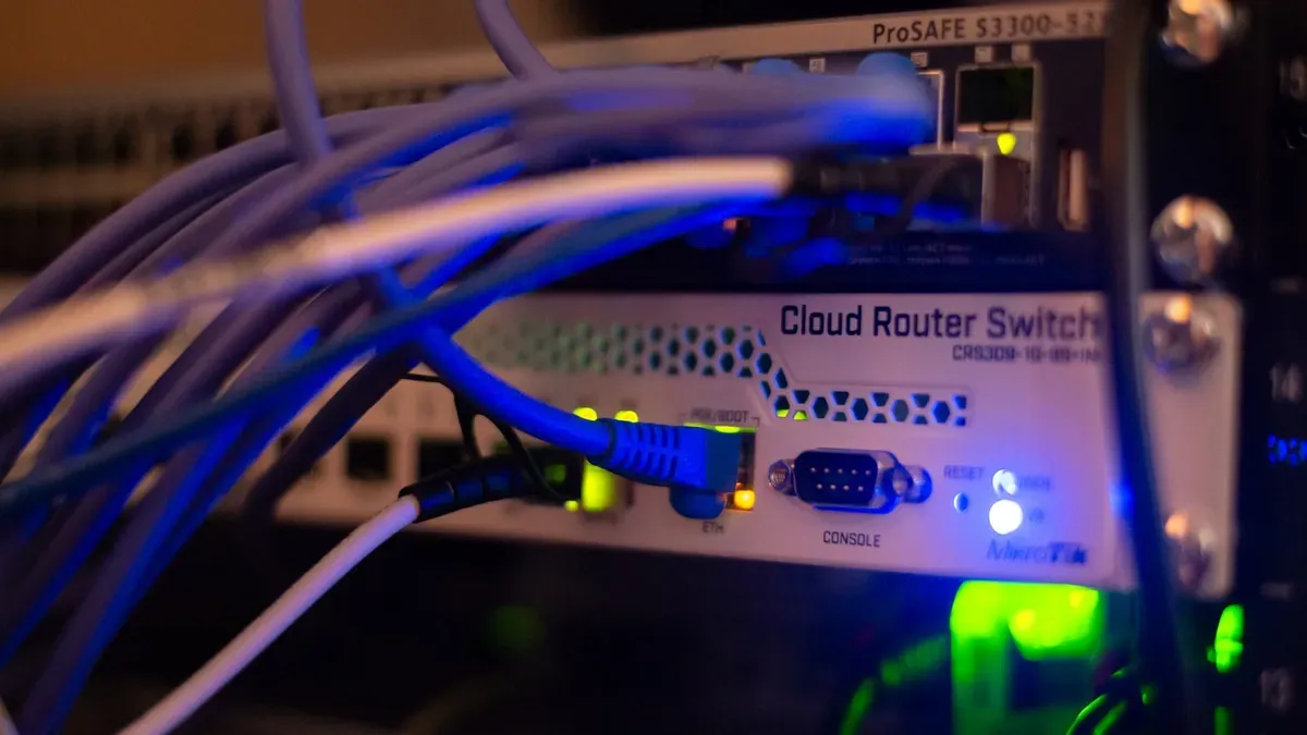Networking equipment with ethernet cables connected, the LAN side a Thread border router bridges onto