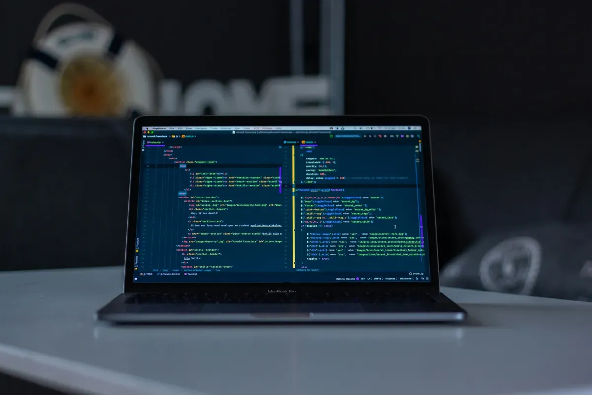 An open laptop with a configuration file on screen