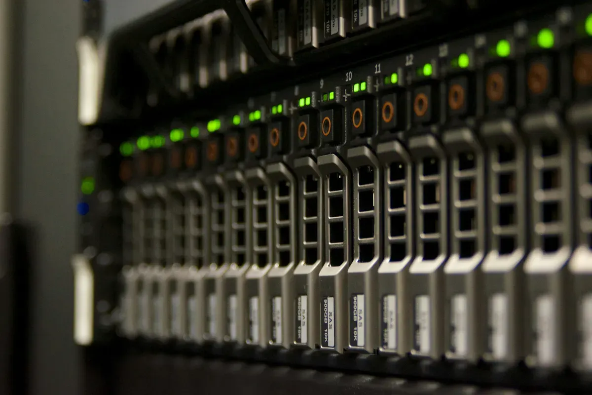 A rack of network gear with rows of status lights