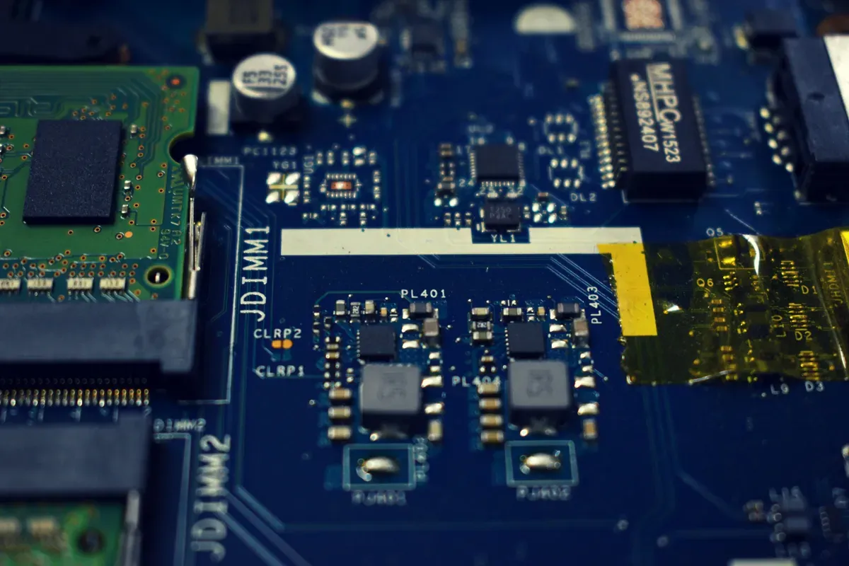 A blue circuit board photographed straight on