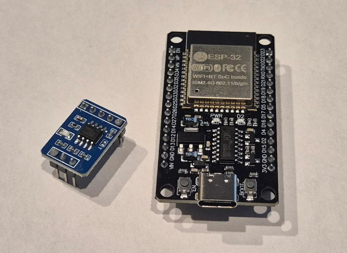 The two boards used in this guide: a USB-C ESP32 dev board and a small MAX485 RS485 module, both with header pins fitted