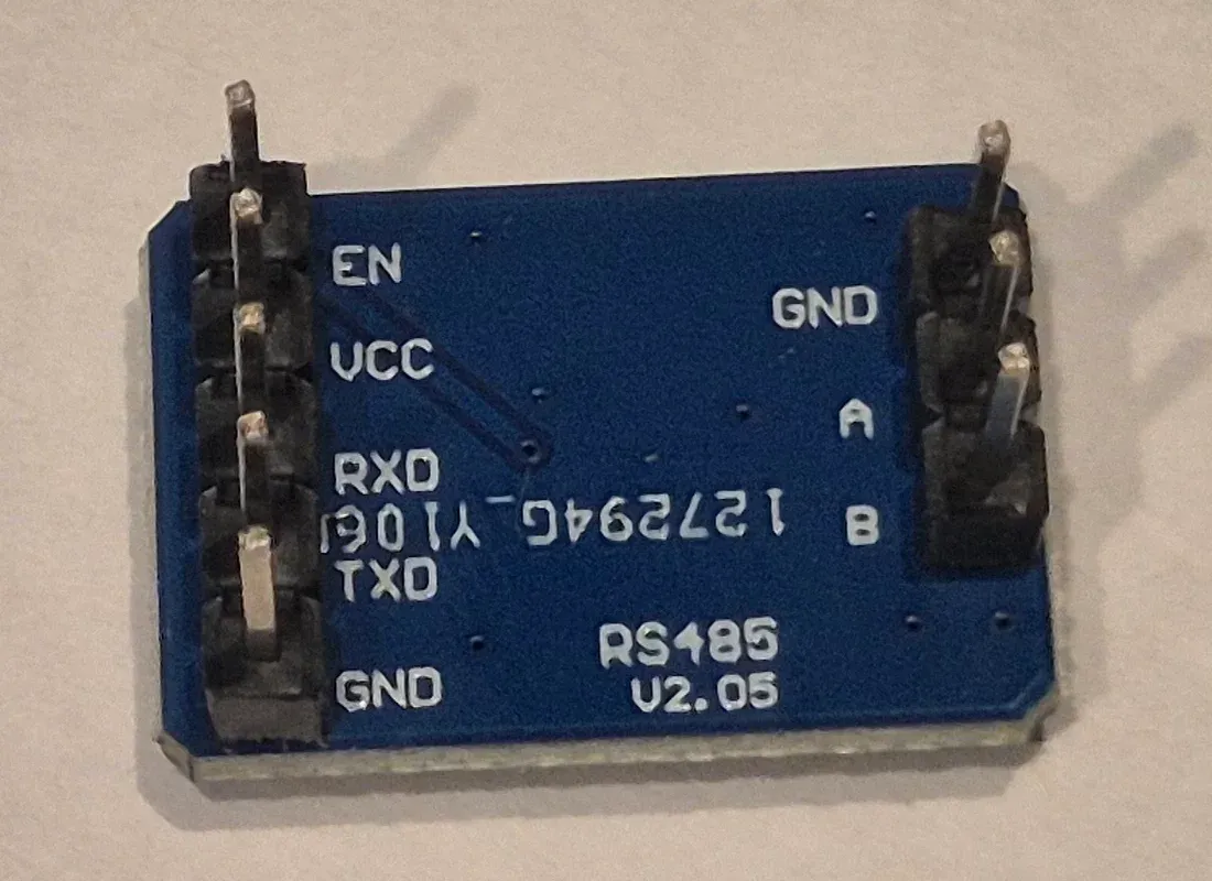 Back of the RS485 module with silkscreen labels: EN, VCC, RXD, TXD, GND on one side and GND, A, B on the other