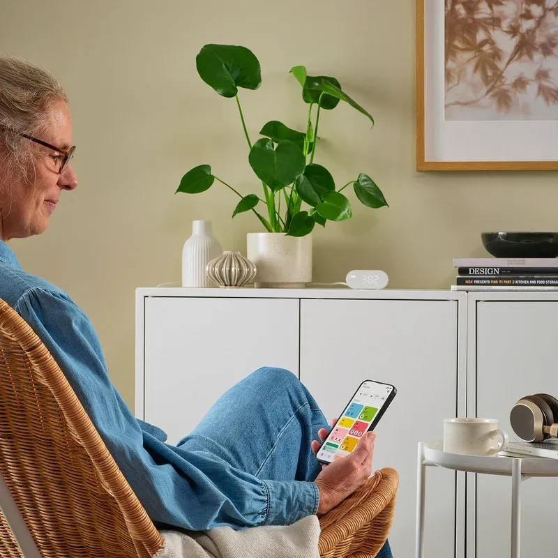 IKEA ALPSTUGA air quality sensor close-up showing the display with air quality metrics