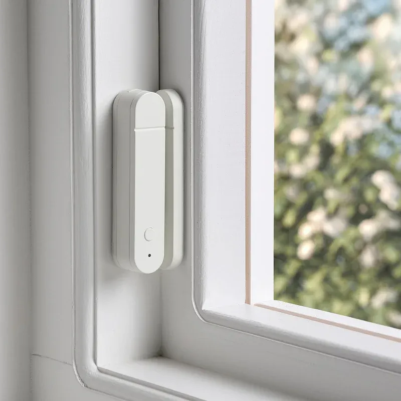 IKEA KLIPPBOK door window sensor installation on a door frame with magnet aligned
