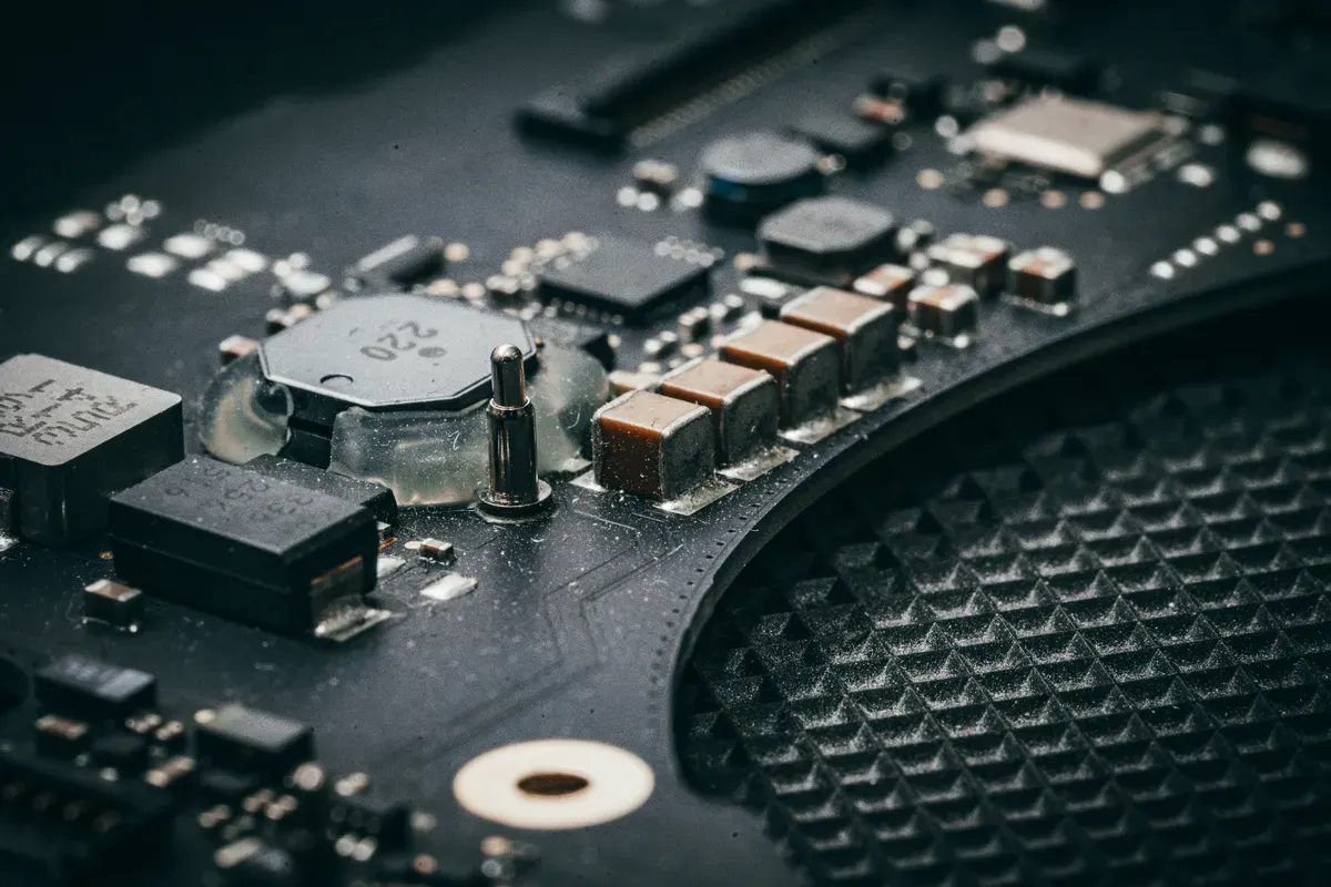 A complex circuit board packed edge to edge with components
