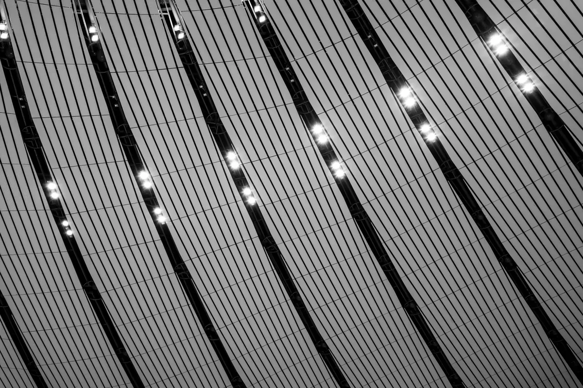 Parallel lines of light running away into the dark