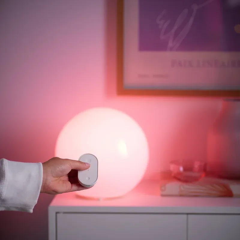 IKEA KAJPLATS smart bulbs in a pendant lamp fixture showing warm ambient lighting