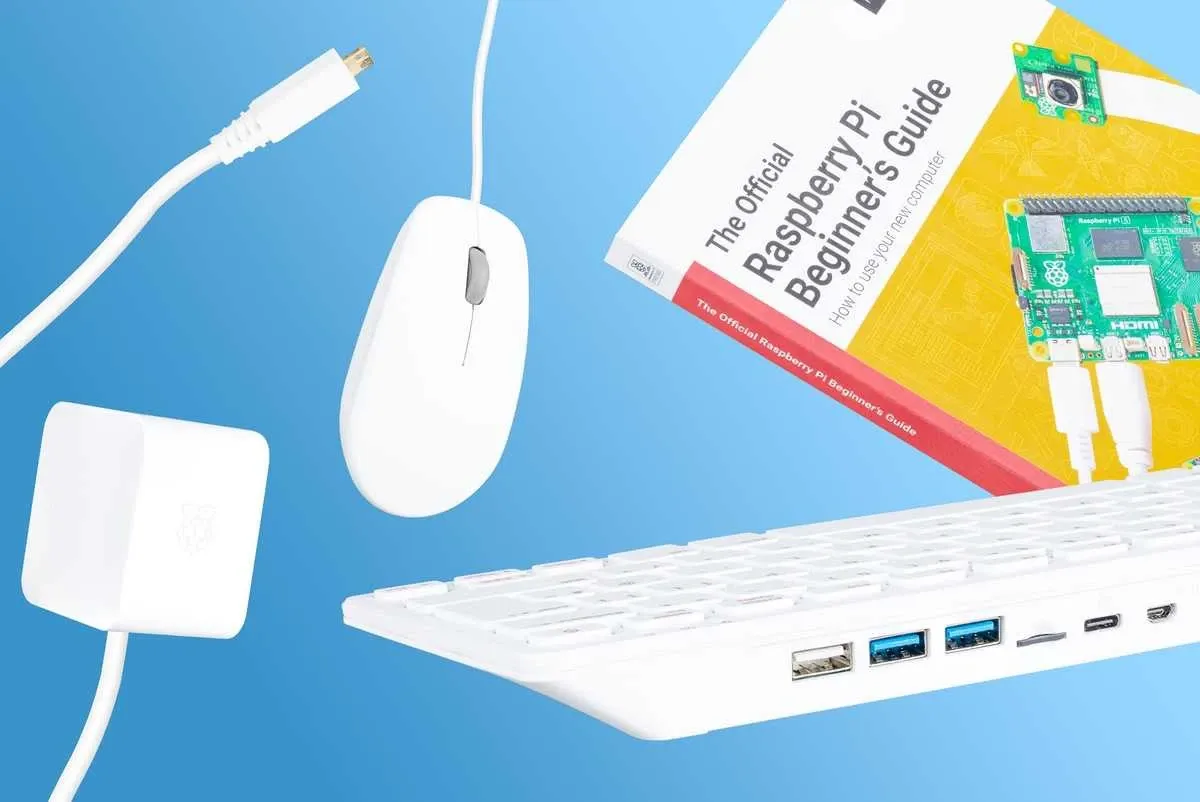 Raspberry Pi 500 starter kit with keyboard computer, power adapter, HDMI cable, and SD card