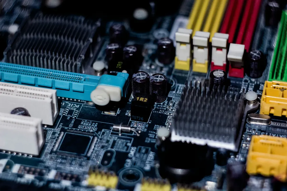 A motherboard with wires and connectors running off it