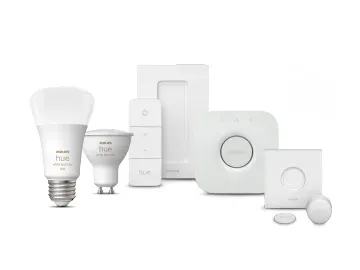 Philips Hue smart lighting ecosystem showing bulbs, switches, and sensors compatible with Bridge Pro