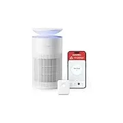 SwitchBot air purifier showing app interface on smartphone display