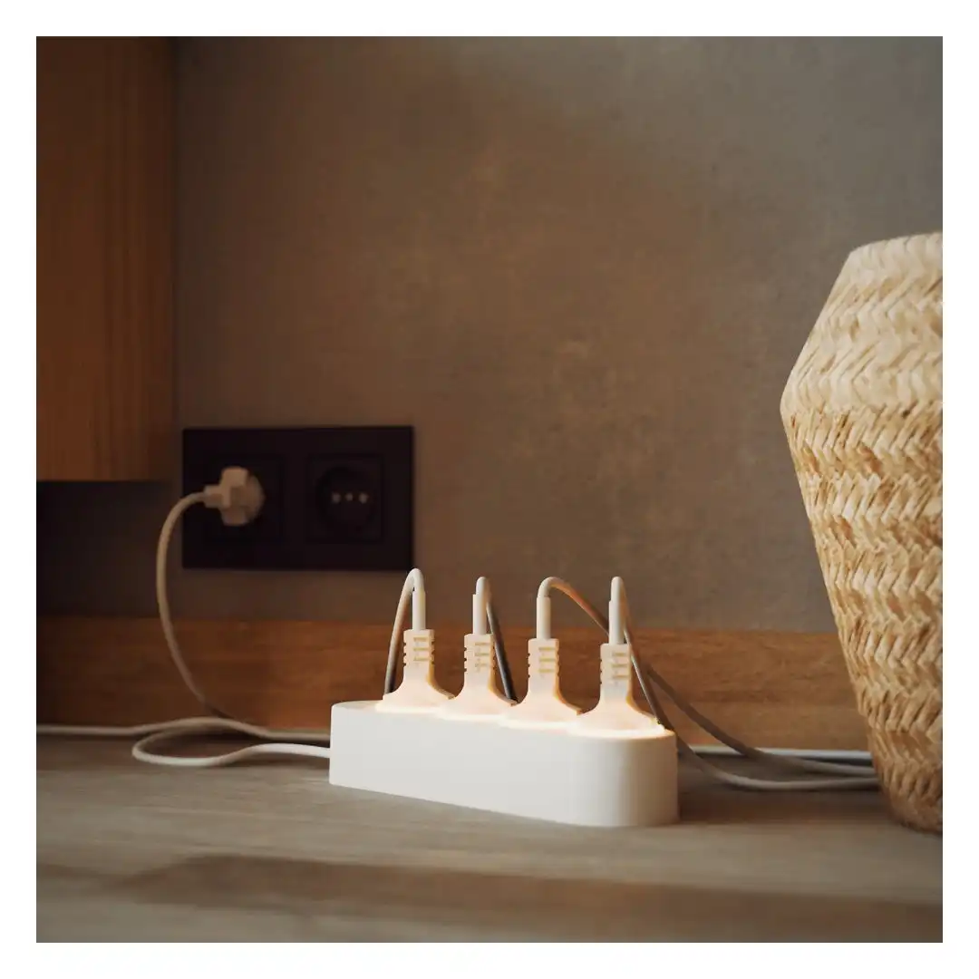 Shelly Power Strip 4 Gen4 in a modern home office workspace with multiple devices