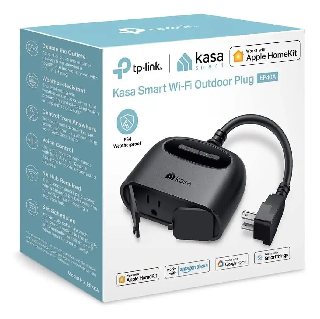 Tapo P400M outdoor plug installed in garden showing weather resistance